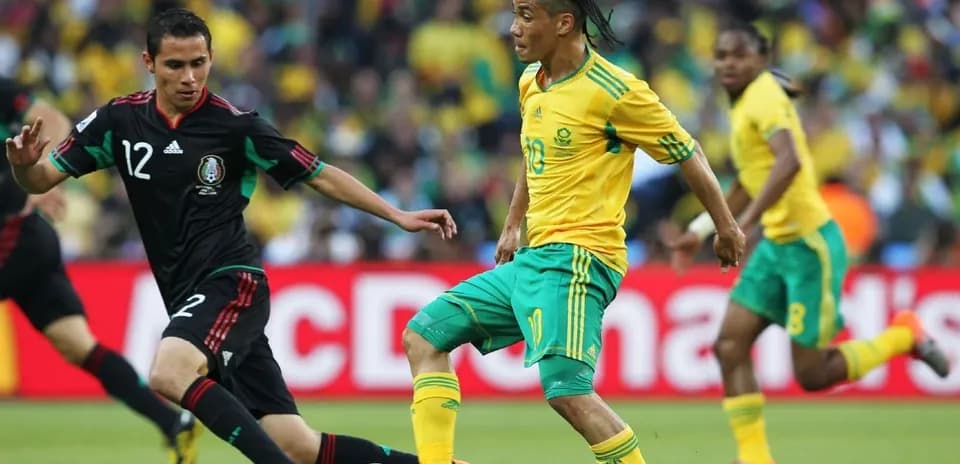 Player dribbling the ball during a soccer match