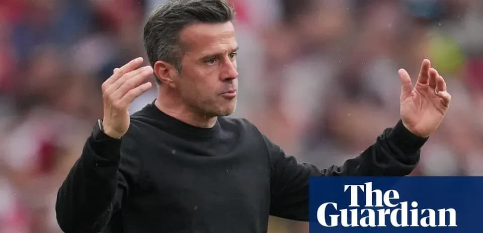 Manager gesturing during match on the sidelines