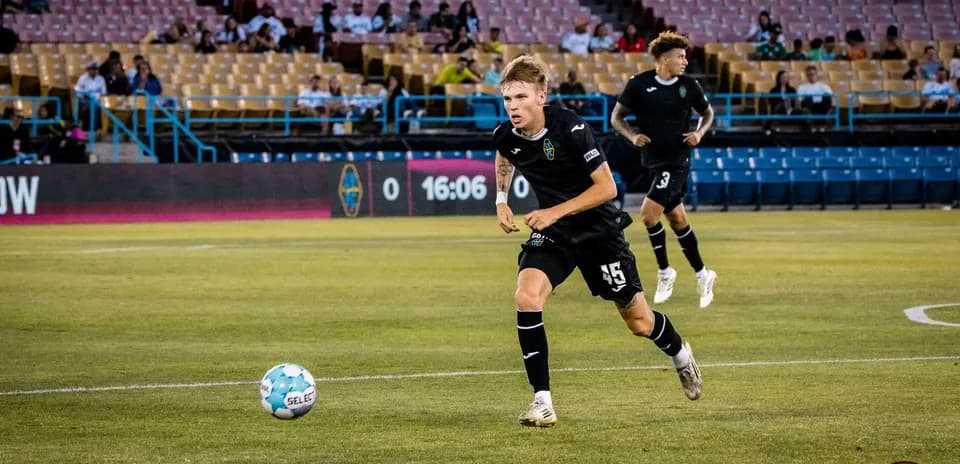Player dribbling ball during Las Vegas Lights match