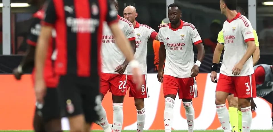 Benfica players celebrating during match against AC Milan