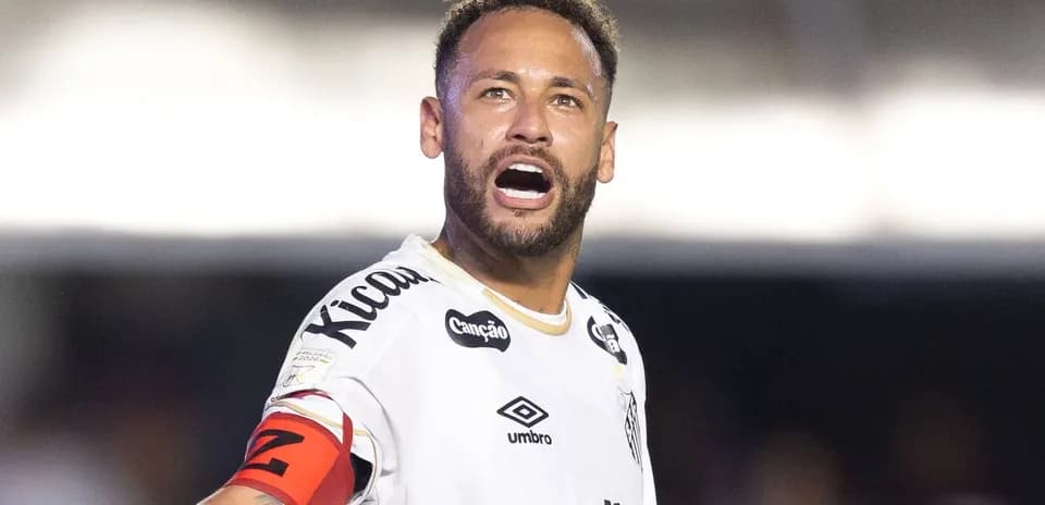 Player shouting on field wearing team jersey