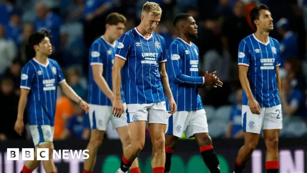 Rangers players walking off the pitch after match
