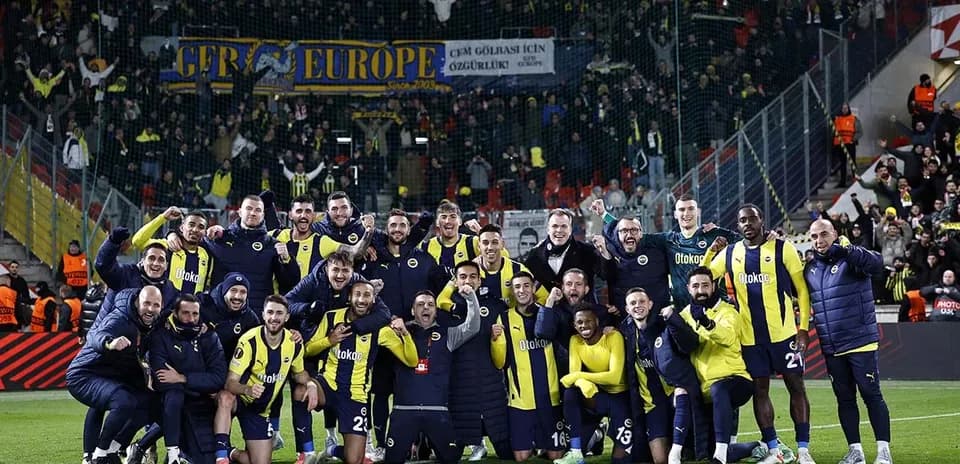 Fenerbahçe team celebrating with fans