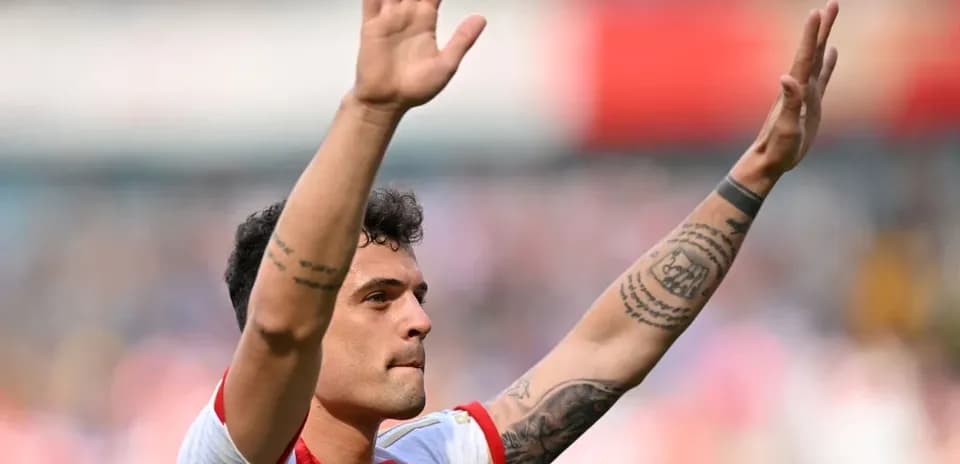 Player waving to fans after match conclusion