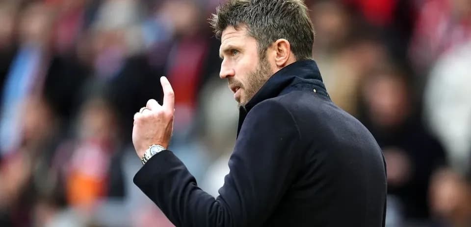 Manager giving instructions during a match