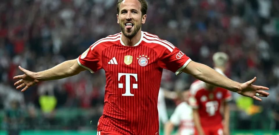 Player celebrating goal wearing Bayern Munich jersey