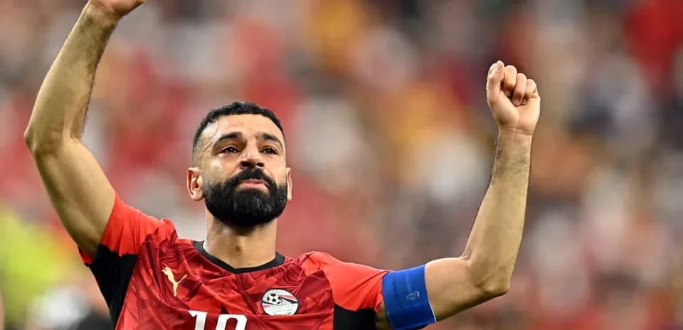 Egyptian player celebrating with raised fist