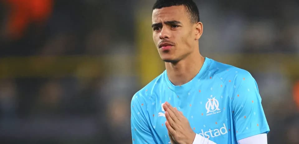 Player warming up in Marseille training kit