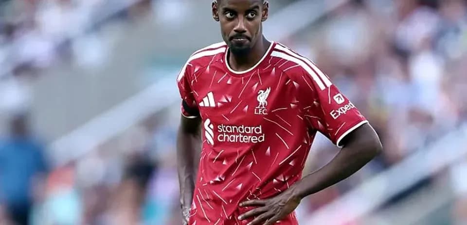 Liverpool player during match, looking focused