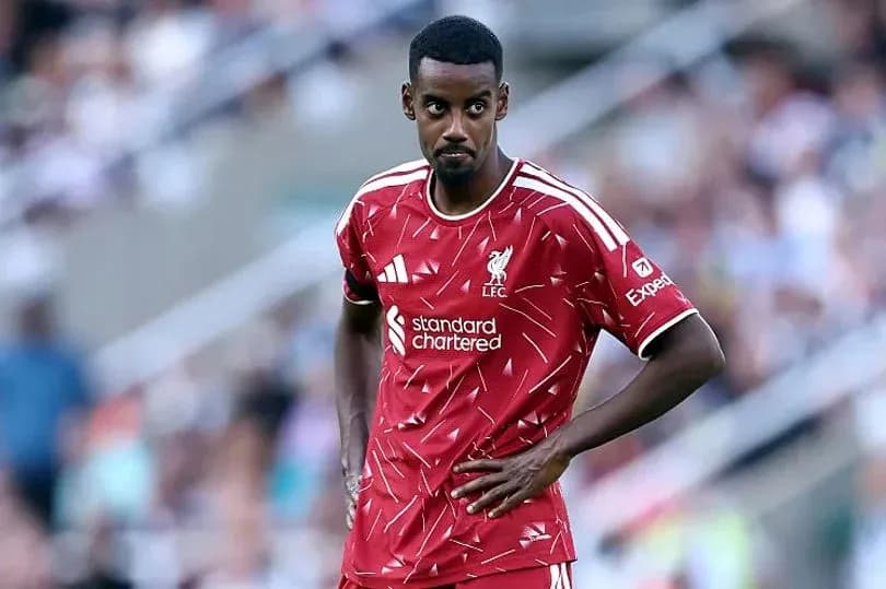 Liverpool player during match, looking focused