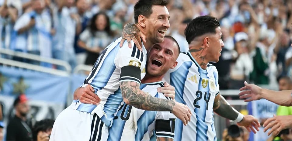 Argentina players celebrating a goal on the field