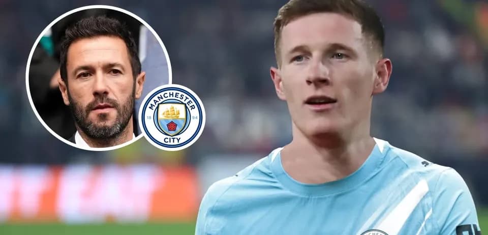Manchester City player on the field with logo