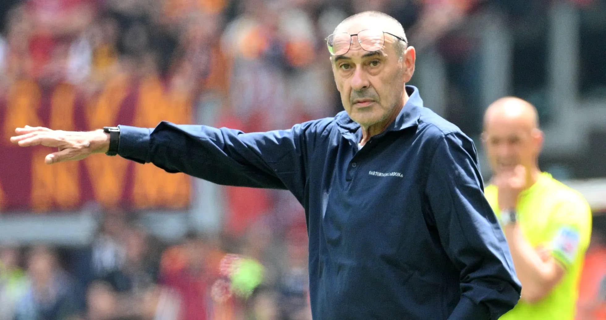 Manager gesturing on the sidelines during match