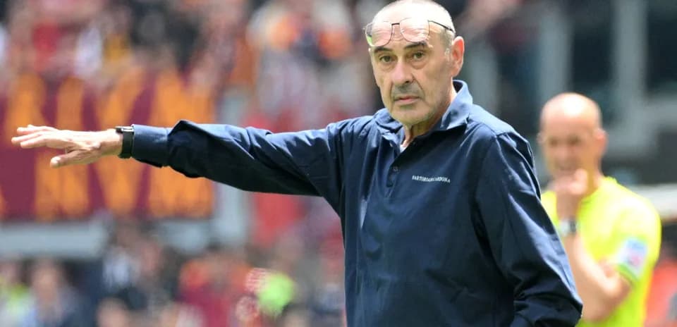 Manager gesturing on the sidelines during match