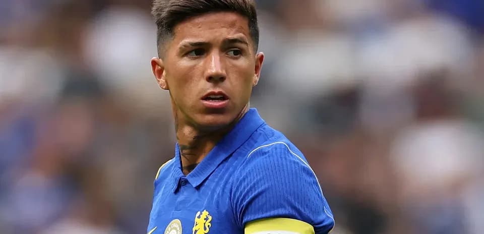 Player in blue jersey wearing captain armband