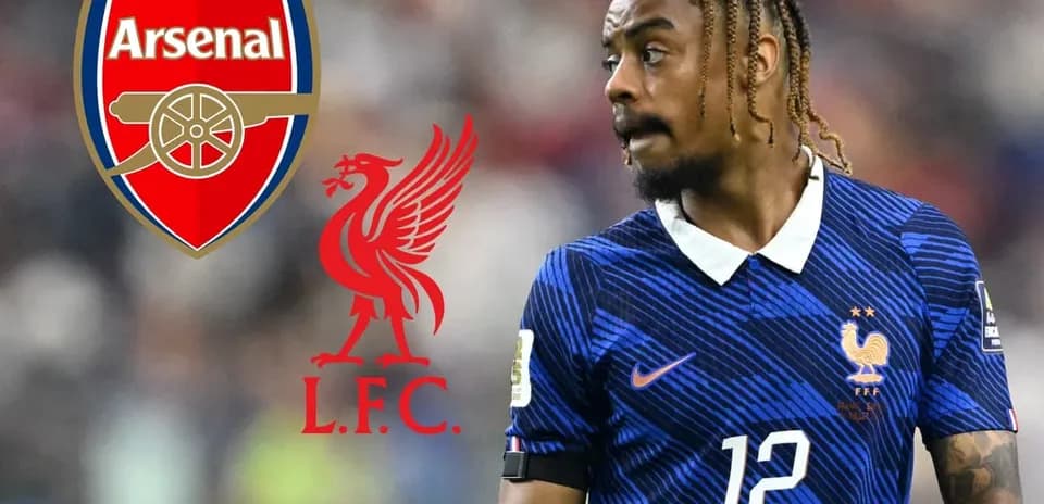 Player in France kit with Arsenal and Liverpool logos