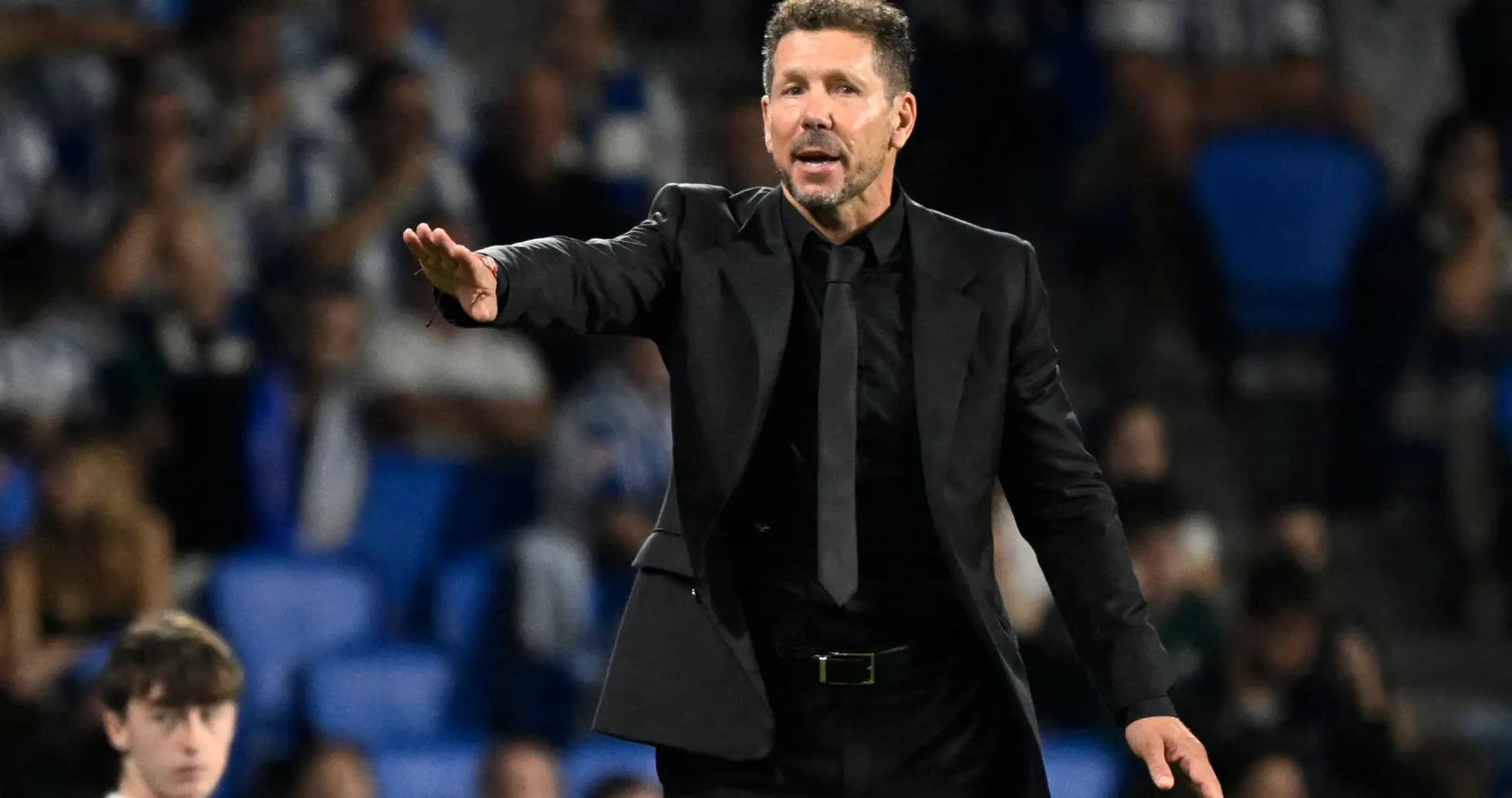 Coach giving instructions during a match