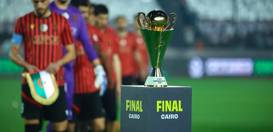 Teams lined up with trophy before final match