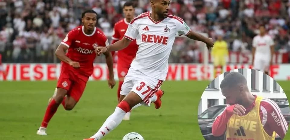 Player running with ball during football match