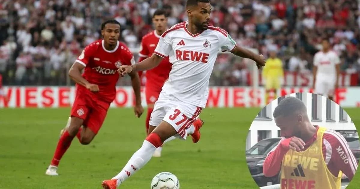 Player running with ball during football match