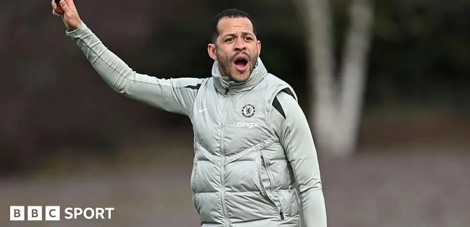 Chelsea coach directing players during training session
