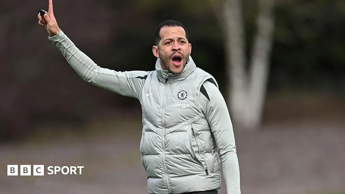 Chelsea coach directing players during training session