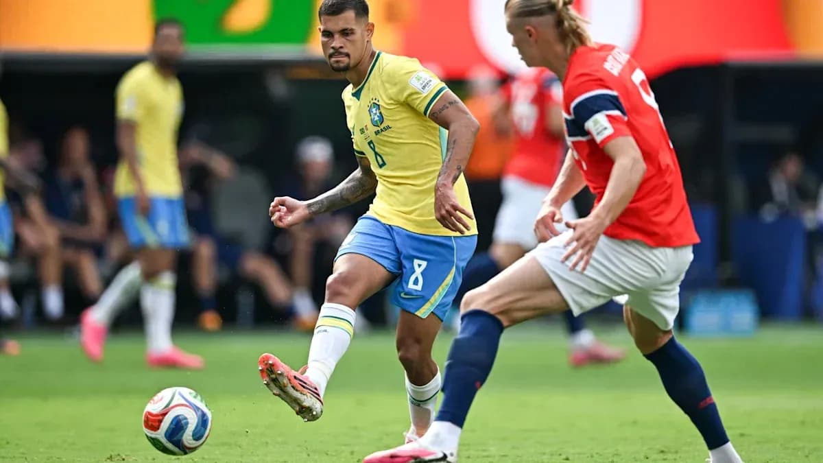 Brazilian player dribbling past Norwegian defender