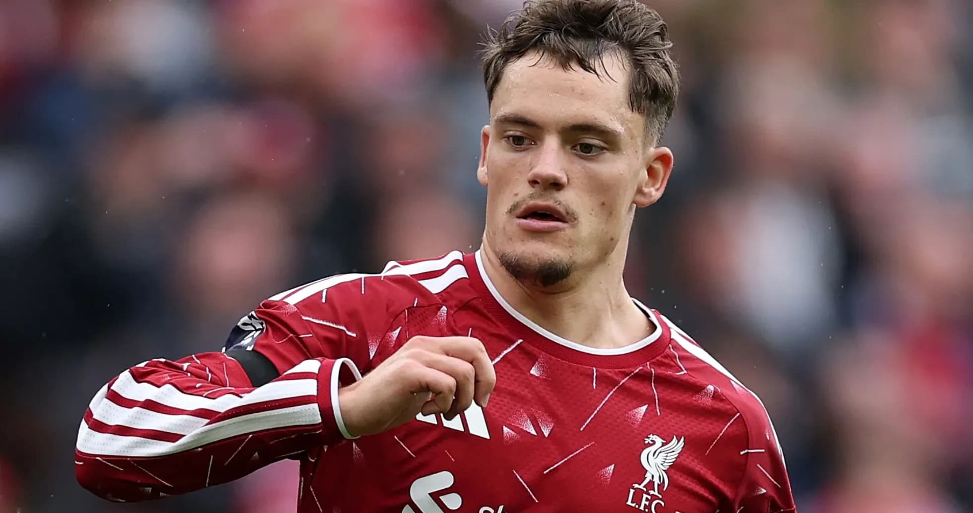 Player in Liverpool FC kit during match action