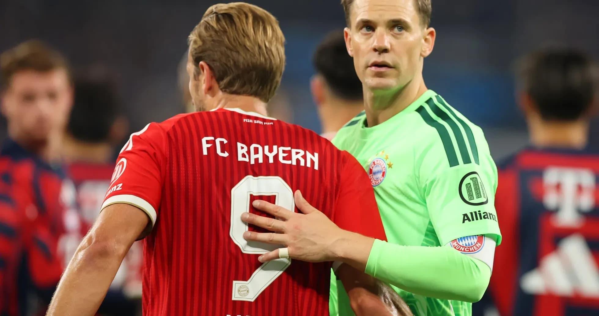 Bayern players discussing during UEFA Champions League match
