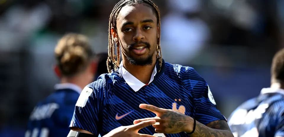 Player gesturing during training session for France team