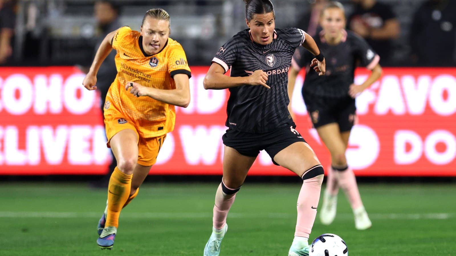 Players competing in NWSL match between teams