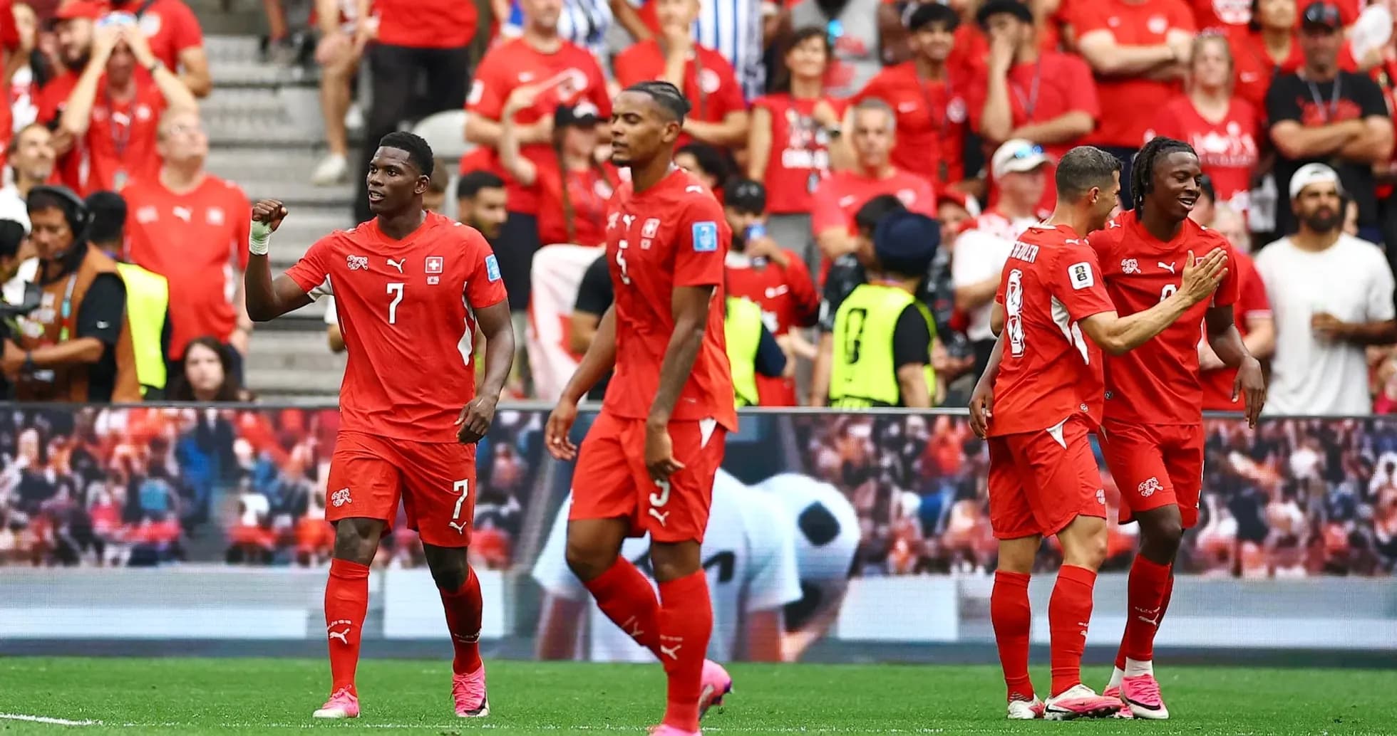 Switzerland players celebrating a goal during match