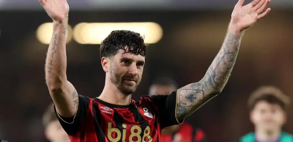 Player celebrating with fans after match