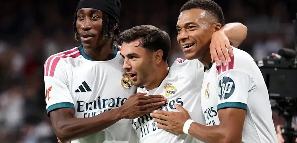 Real Madrid players celebrating after a goal