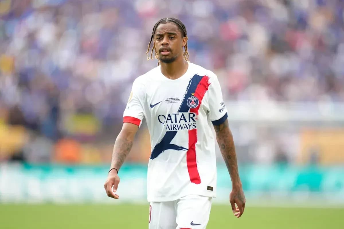 Player walking on the field in PSG jersey