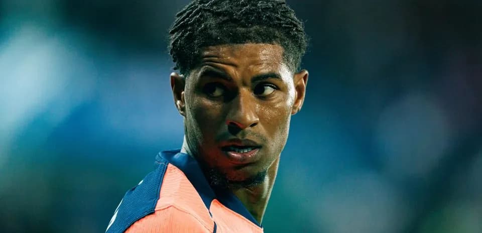 Football player looking back during match