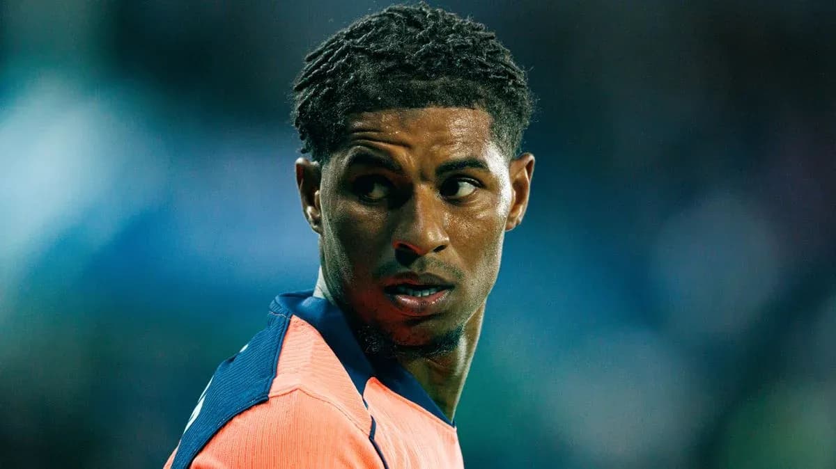 Football player looking back during match