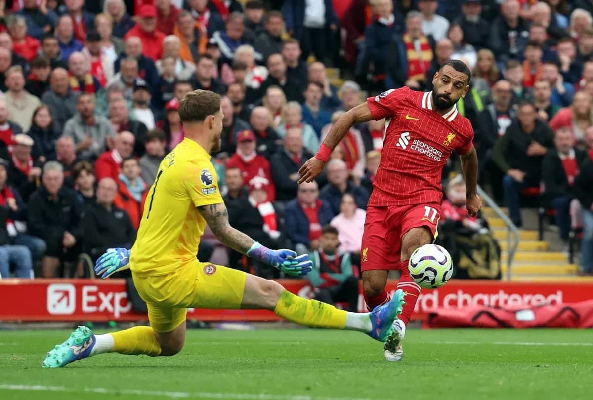 Liverpool player attempting to score against Brentford