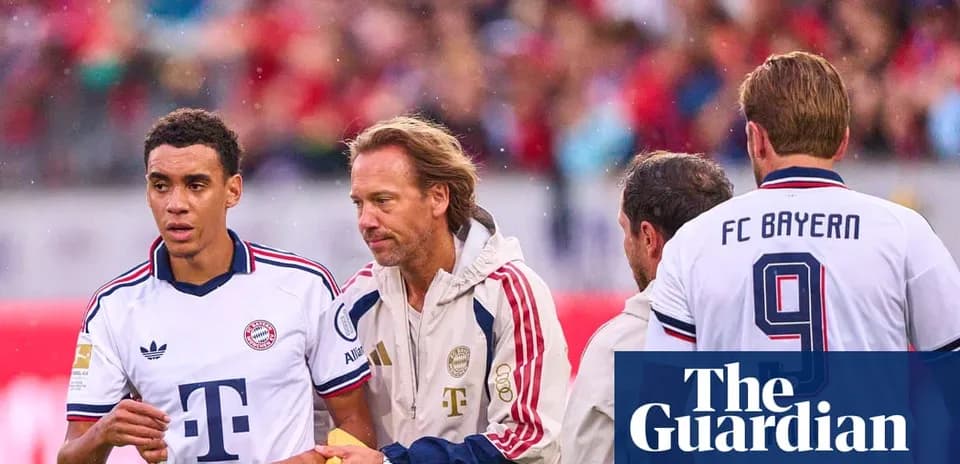 Bayern Munich players and staff during match substitution