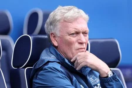 Manager sitting pensively on the bench