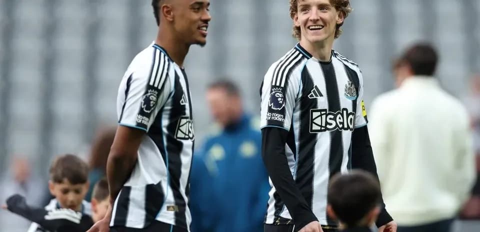 Newcastle players interacting during warm-up session