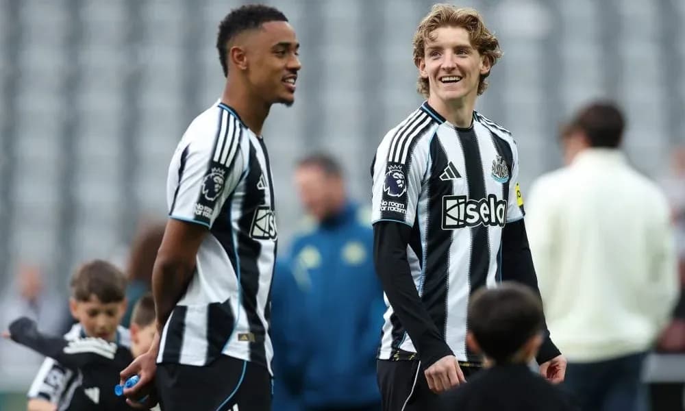 Newcastle players interacting during warm-up session