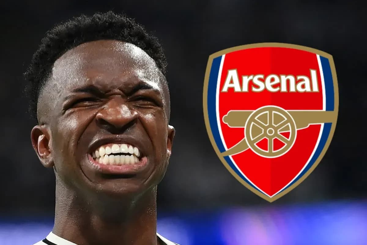 Player celebrating with Arsenal logo in background