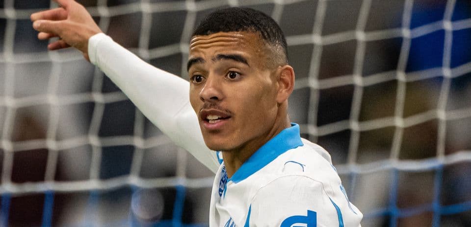 Player celebrating a goal with raised arm
