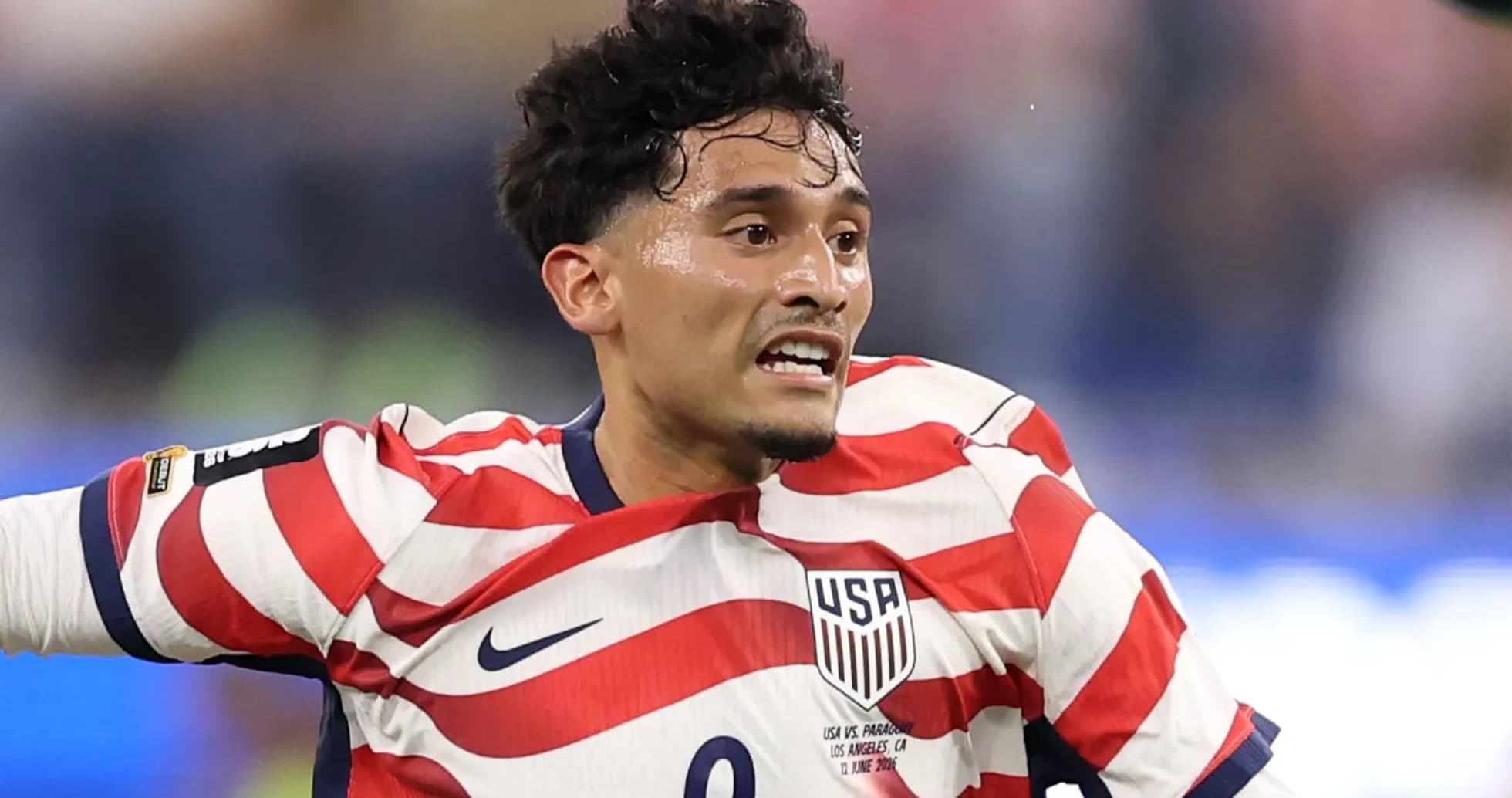 Player in USA jersey during a soccer match