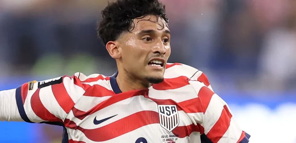 Player in USA jersey during a soccer match