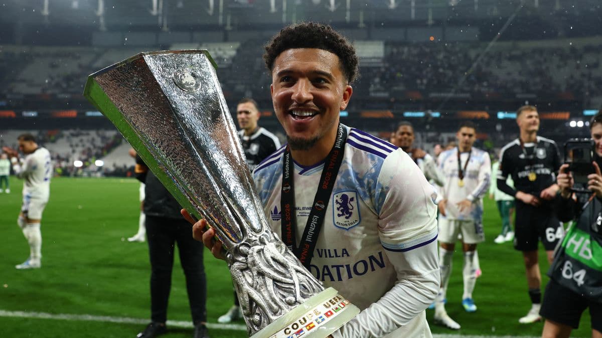 Player celebrating with trophy after winning match