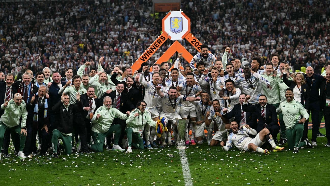 Team celebrating victory with trophy and confetti