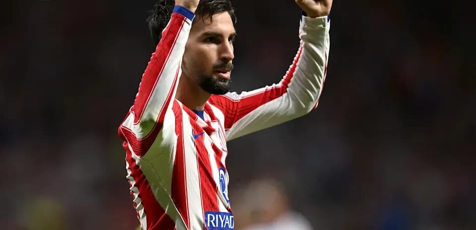 Player celebrating with raised fists during match