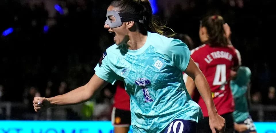 Player celebrating after scoring a goal in match